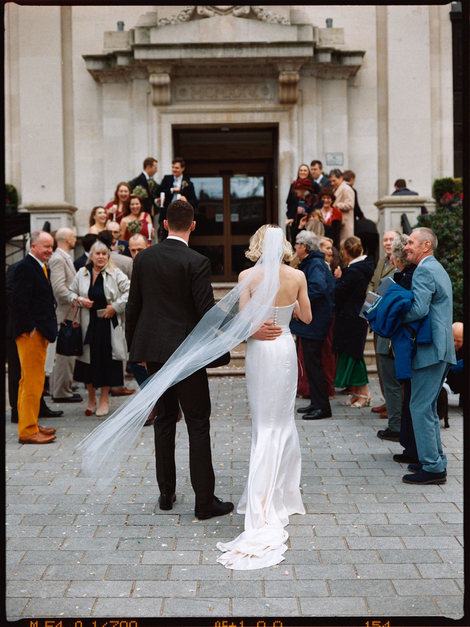 Liz and Ben's London wedding at Say I Do Islington was everything we love about city weddings – colourful streets, iconic backdrops, heartfelt moments and a beautiful greenhouse-style reception. Shot across digital and two rolls of medium format film, their day was relaxed, full of personality and a perfect celebration in the heart of London.