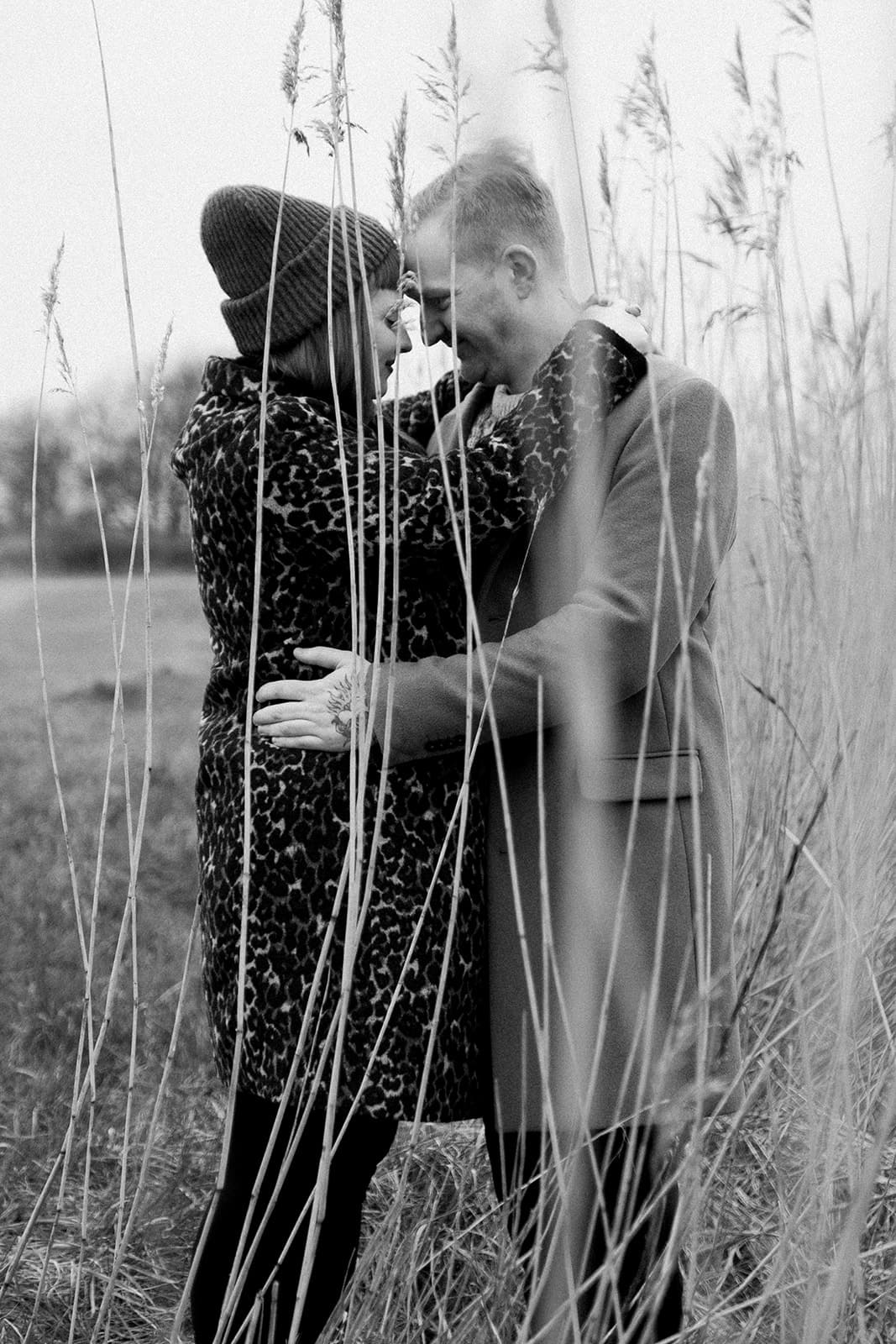 East Usk Lighthouse, couple session, digital photograph, in black and white, in long grass